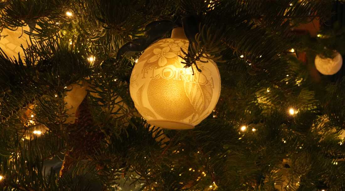 An ornament from each state hangs on the White house Christmas tree in the Blue Room Monday.