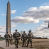 National Guardsmen patrol in front of the Washington Monument on the National Mall on Friday.