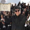 Director Jafar Panahi, winner of the Palme d'Or for the film 'It Was Just an Accident', poses for photographers at the awards ceremony photo call at the 78th international film festival, Cannes, southern France, Saturday, May 24, 2025. (AP Photo/Natacha Pisarenko)