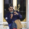 President of Venezuela Nicolás Maduro dances during a march as part of the "Venezuelan Student Day" at Miraflores in Caracas, Venezuela, on Nov. 21.