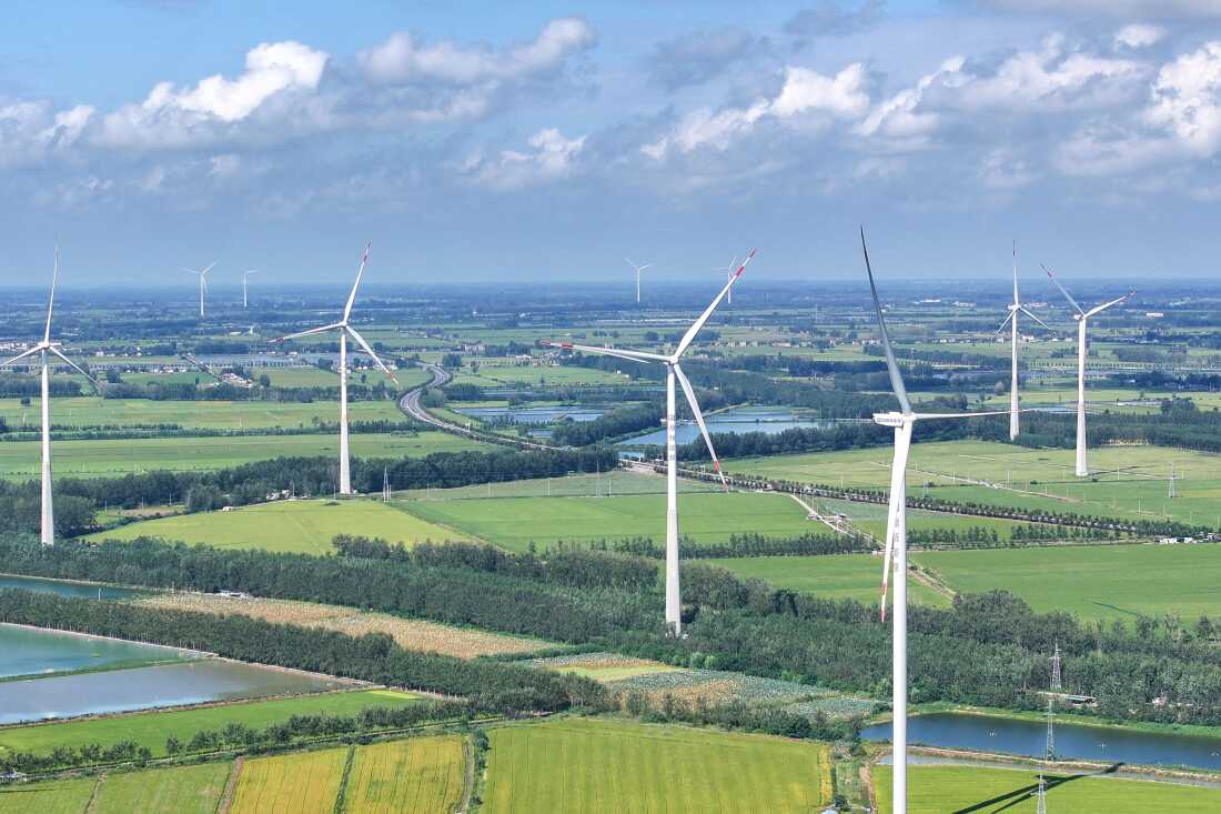 Wind turbines are pictured in Jinhu County, Huai'an City, in China's eastern Jiangsu province on September 22, 2025.
