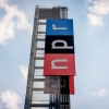 View of the sign outside National Public Radio headquarters on July 22, 2025 in Washington, D.C.
