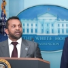 FBI Director Kash Patel delivers remarks as U.S. President Donald Trump looks on during a White House press conference in August 2025.