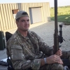 Dustin stateside at an Army base during sniper training. NPR is only using his first name because he fears retribution from the company described in this story.