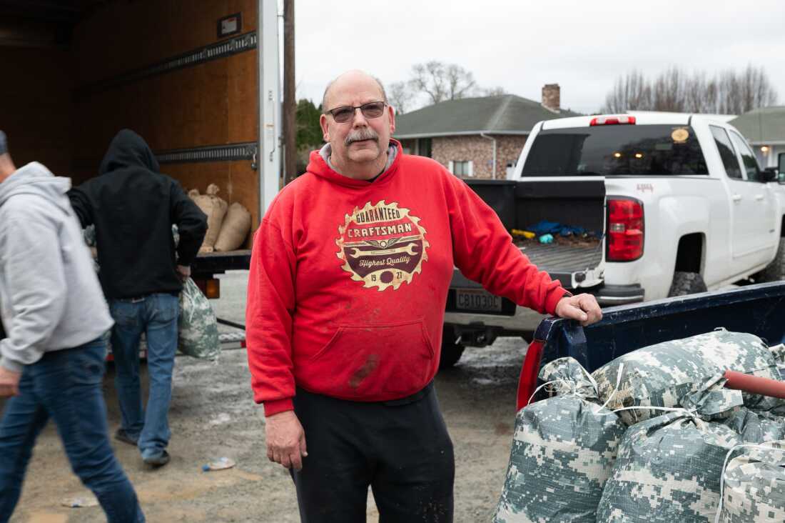 Dennis Reasbeck has lived in Skagit County for decades and he' has never had to evacuate because of flooding, but now he is fortifying his house before leaving town on Thursday.