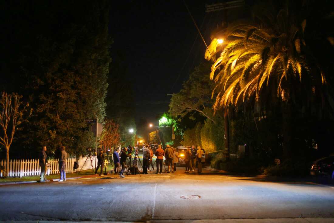 News media gather near Rob Reiner's residence Sunday, Dec. 14, 2025, in the Brentwood section of Los Angeles.