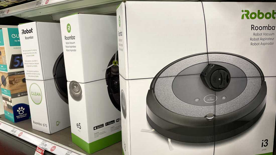Roomba robot vacuums made by iRobot are displayed on a shelf at a Target store in California.