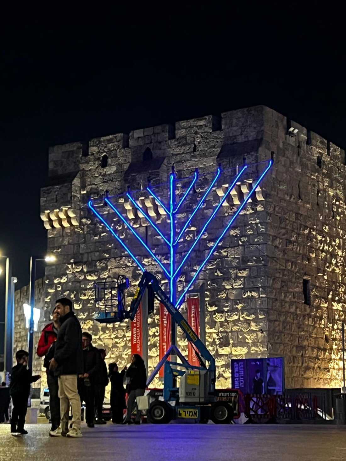 A large menorah stands outside the walls of the Old City in Jerusalem, ready for daily ceremonies to light the candles every night.