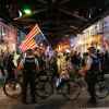 Police officers block a street as demonstrators march at a protest opposing "Operation Midway Blitz" and the presence of ICE, Sept. 9, 2025, in Chicago.