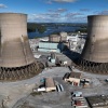 The shuttered Three Mile Island nuclear power plant stands in the middle of the Susquehanna River on October 10, 2024. One of the plant's two reactors partly melted down in 1979, but the second one operated for decades before it was closed. It is now set to be restarted as early as 2028, pending approval by the Nuclear Regulatory Commission.