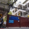 Police enter an immigration detention centre in Bangkok on Jan. 22.
