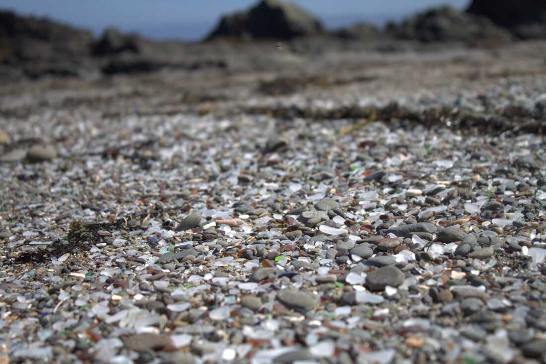 At Glass Beach in Fort Bragg, Calif., glass tumbles day and night in the waves against the pebbles and sand to become smooth.