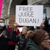 Demonstrators protest in front of the federal courthouse where Milwaukee County Circuit Judge Hannah Dugan appeared in front of a judge after being arrested by the FBI as she arrived for work this morning at the Milwaukee County Courthouse on April 25 in Milwaukee, Wisc.