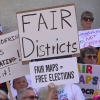 Demonstrators rally outside of the Ohio Statehouse to protest gerrymandering and advocate for lawmakers to draw fair maps in September in Columbus, Ohio.