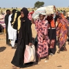 Displaced Sudanese who fled el-Fasher after the city fell to the Rapid Support Forces (RSF), arrive in the town of Tawila war-torn Sudan's western Darfur region on October 28, 2025.