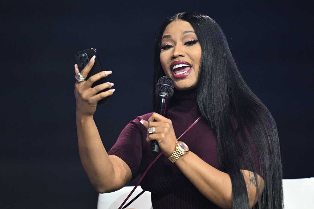 Nicki Minaj speaks during Turning Point USA's AmericaFest 2025, Sunday, Dec. 21, 2025, in Phoenix.