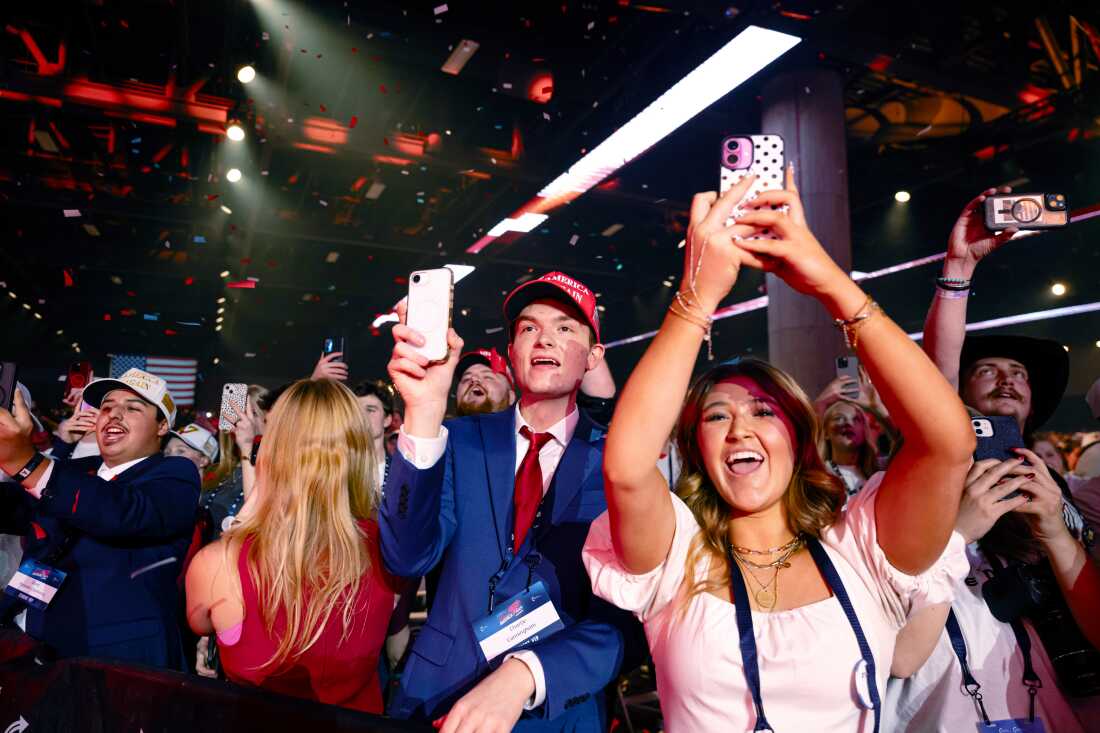 Supporters cheer during Turning Point USA's AmericaFest 2025, Sunday, Dec. 21, 2025, in Phoenix.