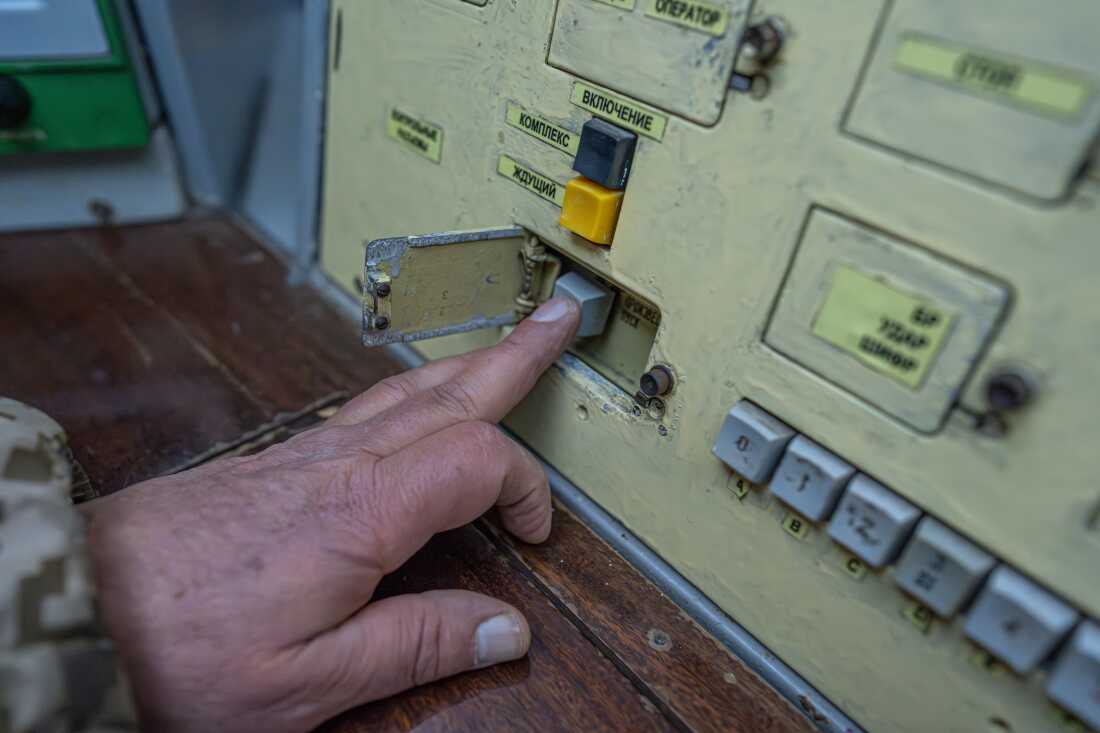 Hennadii Fil former deputy Commander of the 309th Missile Regiment pushing the launch button inside the protected command post of the central position on 5 December 2025 Images: @shtukaanton - Anton Shtuka/NPR