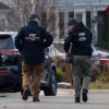 Federal agents have arrested a suspect identified as Brian Cole they are alleging placed two pipe bombs, which never exploded, the night before the Jan. 6, 2021, U.S. Capitol attack. FBI agents gather in front of the suspect's home Thursday in Woodbridge, Virginia. (Photo by Andrew Leyden/Getty Images)
