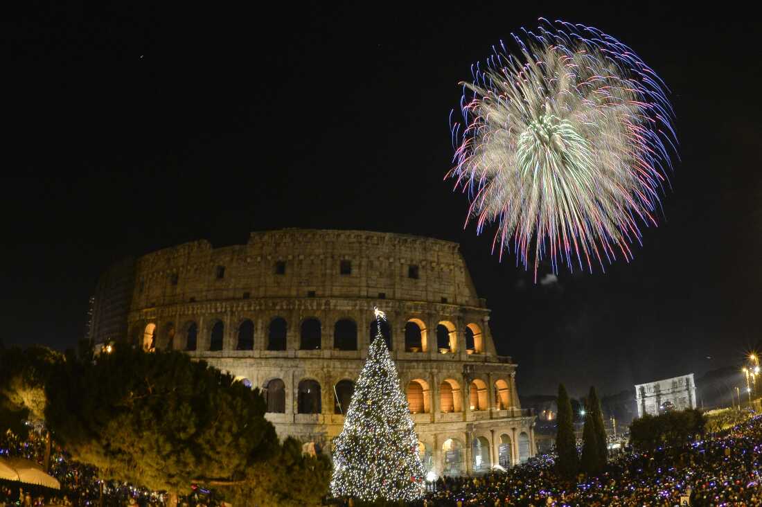 Fireworks welcome the arrival of 2015 outside of Rome's ancient Colosseum. 