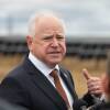 Minn Gov. Tim Walz answers reporters’ questions Tuesday, Nov. 19, 2024 after a ceremony marking the completion of Xcel Energy’s Sherco Solar 1 project northwest of Becker, Minn. The project is expected to provide power for as many as 150,000 homes.