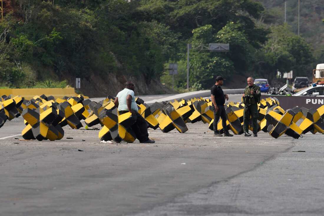 Concrete blocks block the highway leading from Simón Bolívar International Airport to Caracas in Maiquetia, Venezuela.