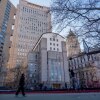 People play basketball in front of Daniel Patrick Moynihan United States Courthouse in New York City on Sunday. Maduro is set to make his first court appearance on Monday.