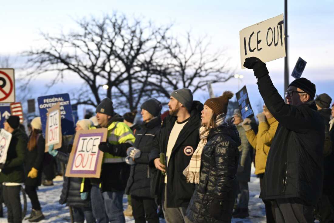 Protesters gather outside the Bishop Henry Whipple Federal Building, Thursday, Jan. 8, 2026, in Minneapolis.