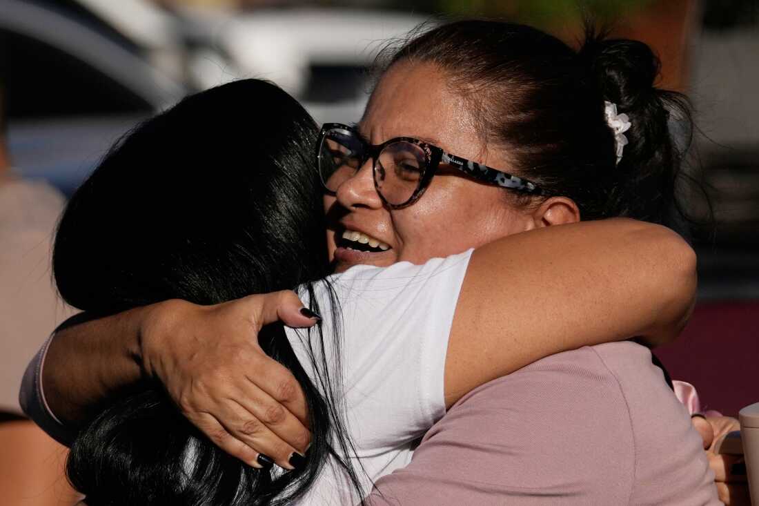 Relatives of detainee Yosnars Baduel embrace outside the Rodeo I prison in Guatire, Venezuela, Thursday, Jan. 8, 2026, after National Assembly President Jorge Rodriguez said the government would release Venezuelan and foreign prisoners. 