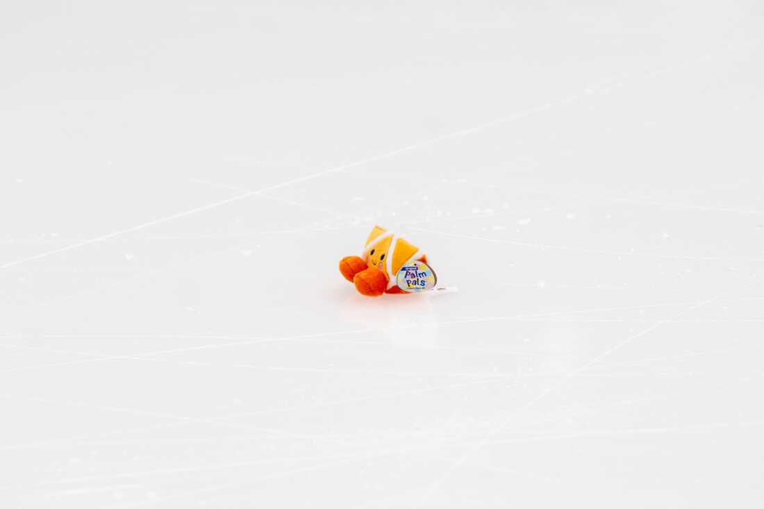 A stuffed orange sits on the ice following a women’s short program performance during the 2026 U.S. Figure Skating Championships at the Enterprise Center on Wednesday, Jan. 7, 2026, in St. Louis’ Downtown West neighborhood.