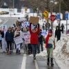 Young students march near Kenny Community School in Minneapolis a day after an ICE agent shot and killed a 37-year-old woman on Thursday, Jan. 8, 2026.