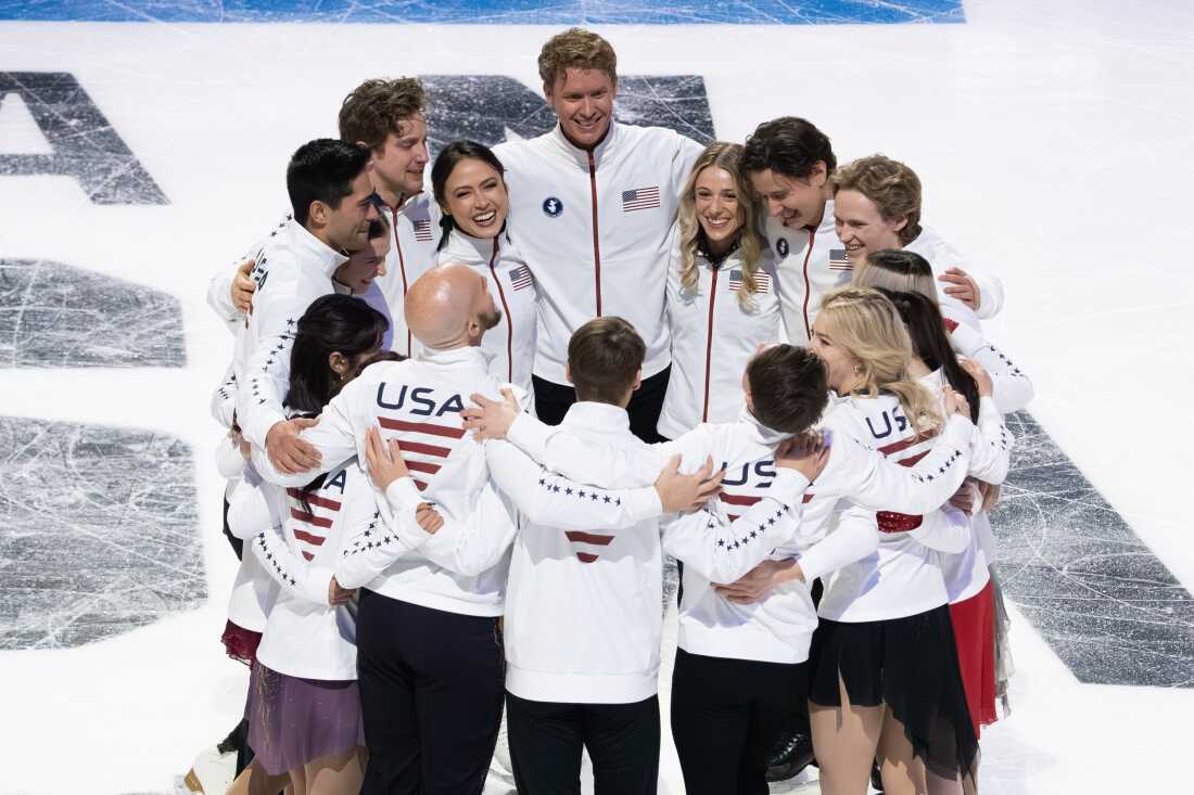 The 2026 U.S. Olympic figure skating team celebrates on the ice after being announced in St. Louis on Jan. 11.