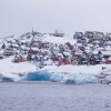 Homes covered by snow are seen from the sea in Nuuk, Greenland, on March 6, 2025. (AP Photo/Evgeniy Maloletka, File)