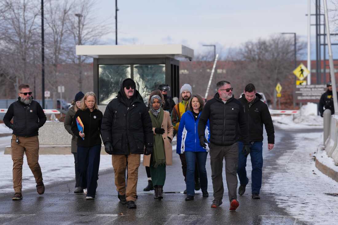 Minn. Representatives, including Kelly Morrison, Ilhan Omar, and Angie Craig leave the Bishop Henry Whipple Federal Building in Minneapolis, Saturday, Jan. 10, 2026.