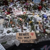 Snow covers a memorial to Renee Macklin Good on Jan. 10 in Minneapolis.