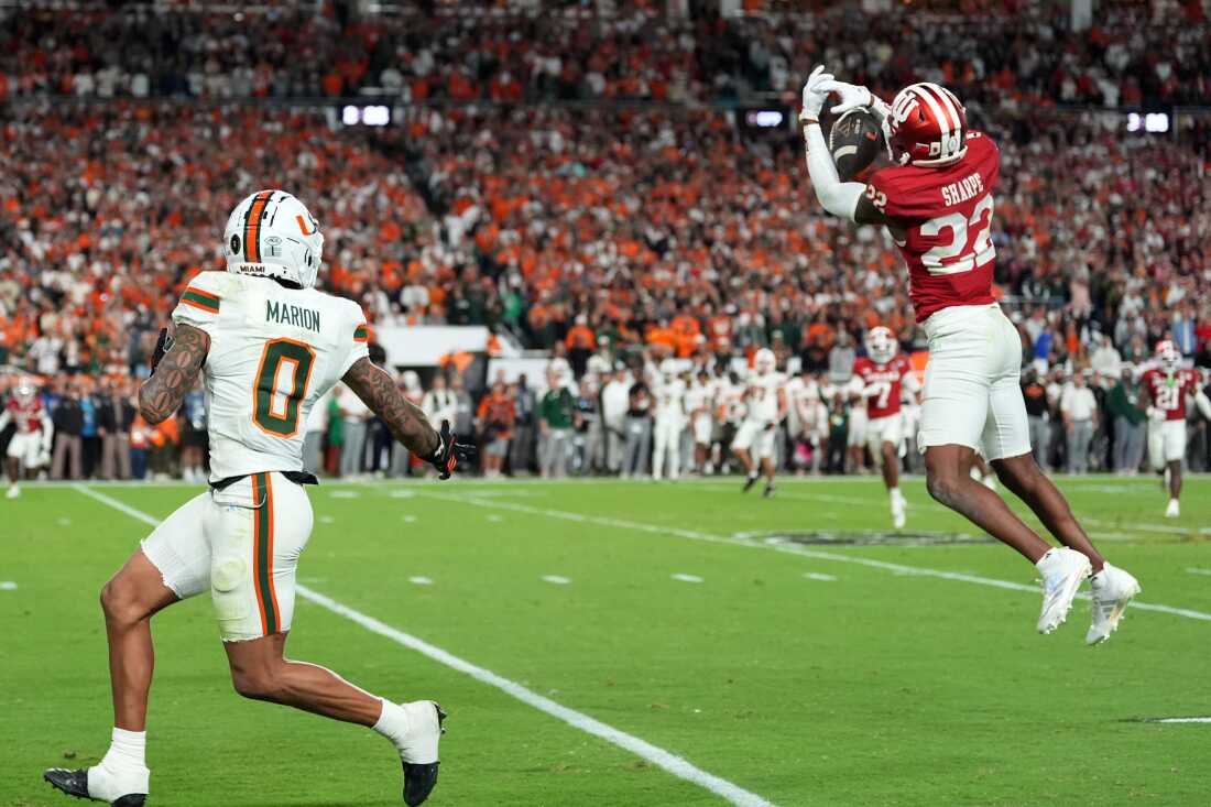 Indiana defensive back Jamari Sharpe intercepts a pass against Miami during the second half of the College Football Playoff national championship game, Monday, Jan. 19, 2026, in Miami Gardens, Fla.