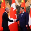 Canada's Prime Minister Mark Carney, left, meets with Chinese President Xi Jinping at the Great Hall of the People in Beijing Friday, Jan. 16, 2026. 