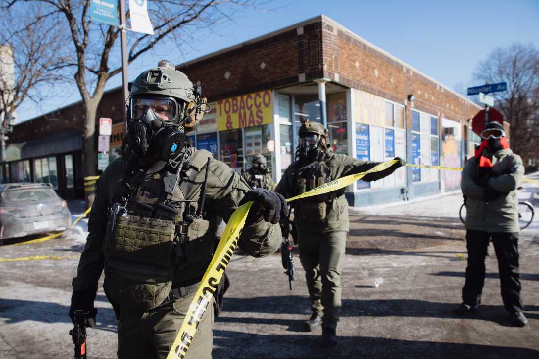 The area where a federal agent killed a man in Minneapolis on Saturday is taped off. Jan. 24, 2026. Zaydee Sanchez for NPR