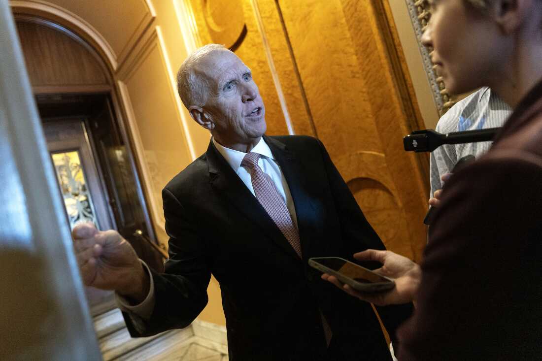 Sen. Thom Tillis, R-N.C., speaks to reporters at the Capitol on Thursday. Tillis says the images coming out of Minneapolis have soured the public on the Trump administration’s immigration policy.