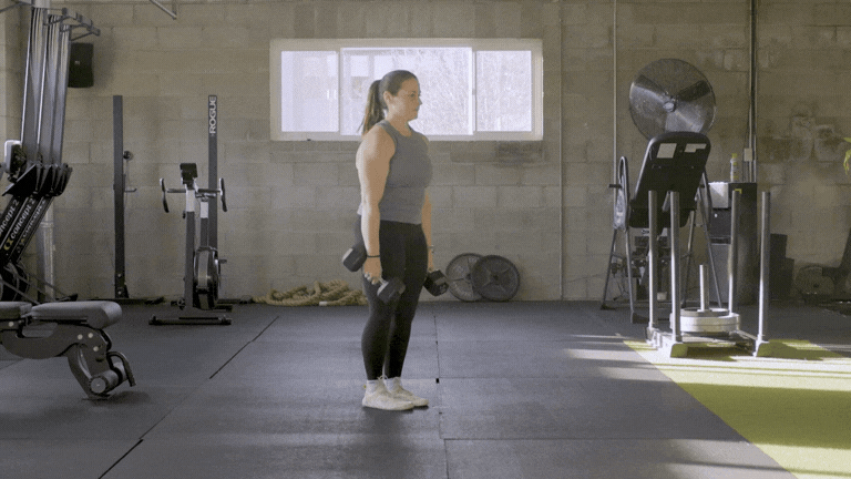 Stand with your feet at hip width. Hold dumbbells by your sides. Begin lowering the weights by pushing your butt out behind you as though you’re closing a car door with it. Tap the weights to the floor. Push your hips forward as you rise up.