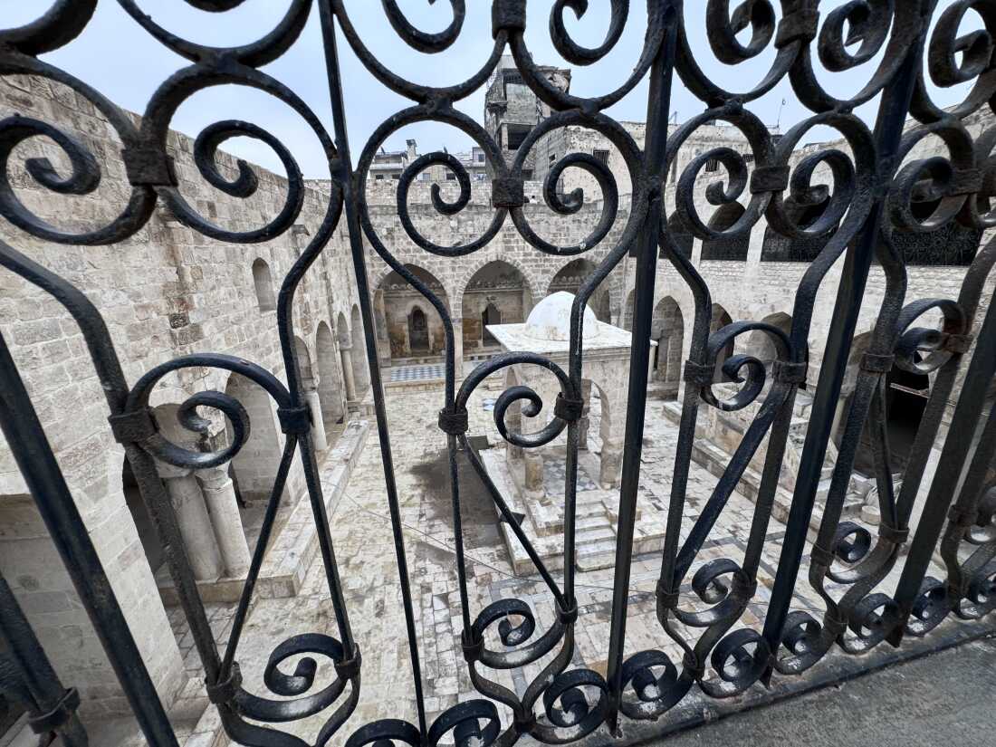 The view from the womens’ section at Aleppo’s central synagogue, also known as the al Bandara synagogue, after the neighborhood. The iron grates on the second floor allowed women to attend prayers without being seen by male worshippers.

