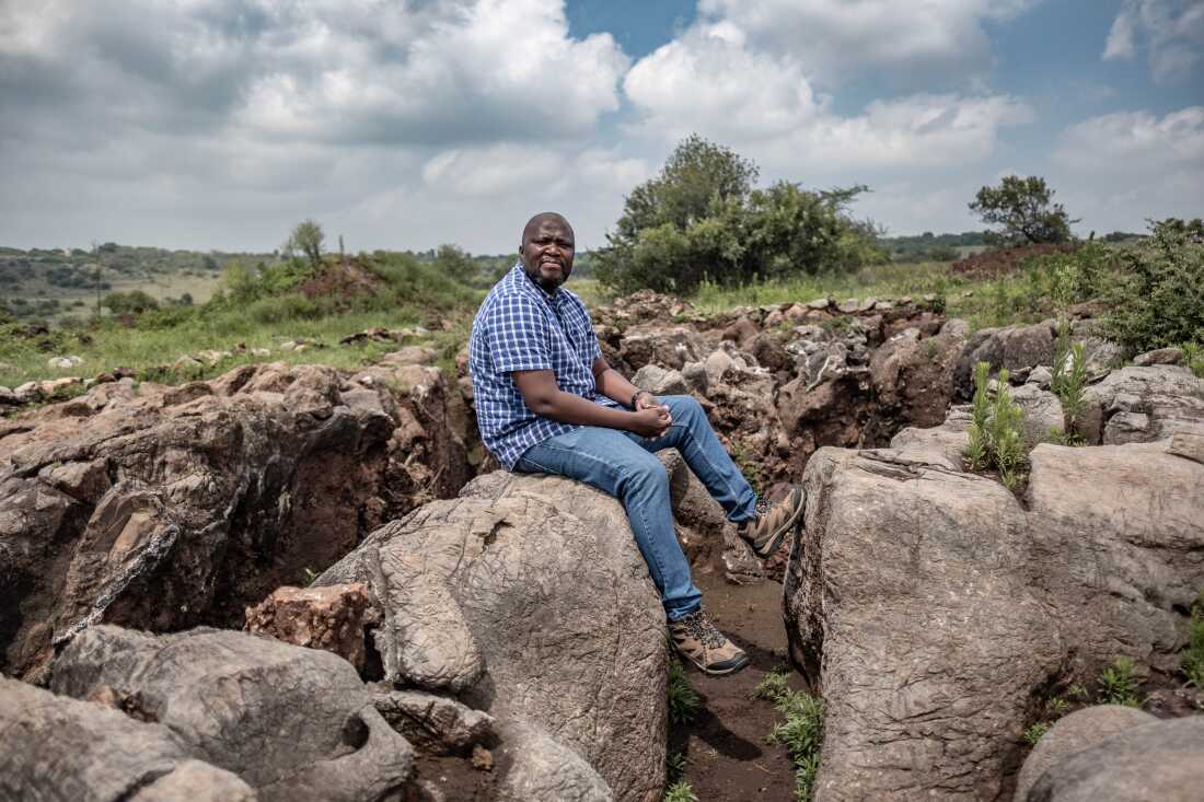 Paleontologist Lazarus Kgasi visits one of his dig sites at the Cradle of Humankind World Heritage site in Gauteng Province, South Africa. Kgasi began his career working as a hired labourer on the dig sites of others but has since become a highly respected paleontologist and a junior curator at Pretoria's Ditsong National Museum of Natural History. He is one of very few Black paleontologists working in South Africa.