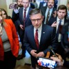 House Speaker Mike Johnson speaks with reporters, who surround him at the U.S. Capitol on February 3.