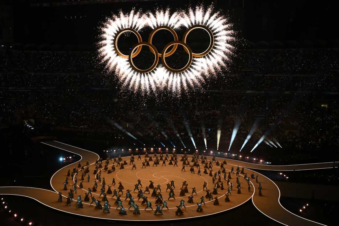 The Olympic Rings are revealed above dancers during the opening ceremony