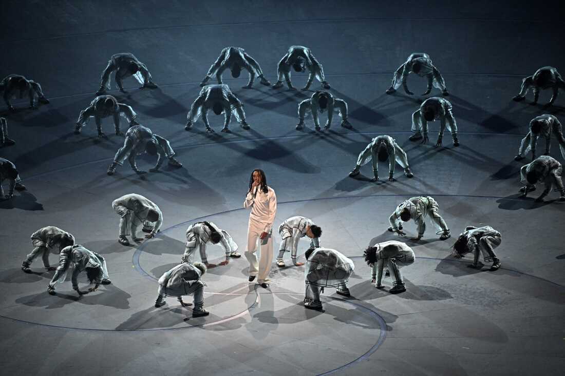 Italian rapper Ghali (center) performs during the opening ceremony.