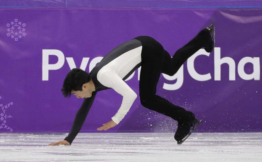 Nathan Chen of the United States falls while performing during the men's short program figure skating in the Gangneung Ice Arena at the 2018 Winter Olympics in Gangneung, South Korea.